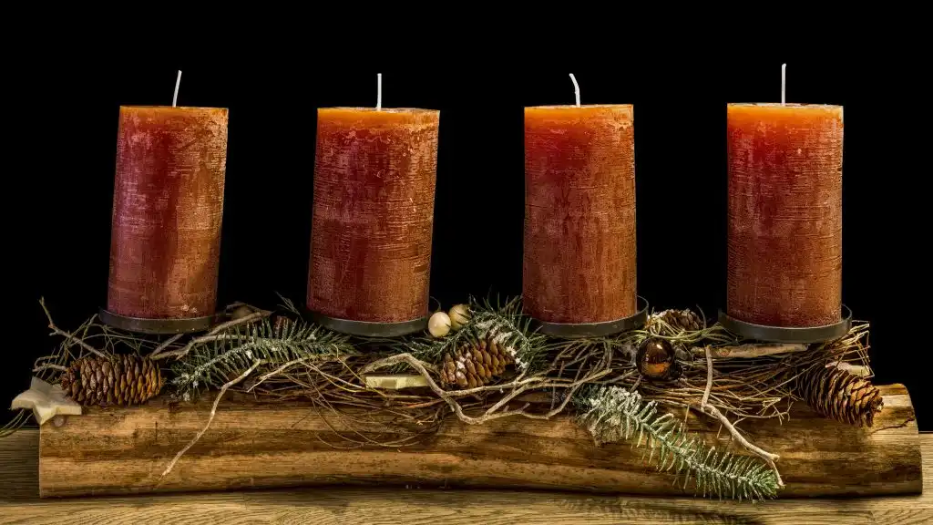 Four brown wax candles